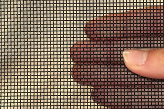 Molybdenum wire mesh with square holes and black graphite on surface